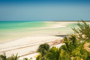 Panoramic view of the beach Caribbean Sea view in Holbox island Mexico. Low tide creates islands of sand in the middle of the turquoise sea