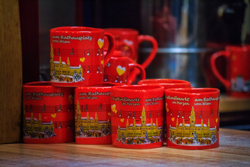 Festive cityscape - view of the Christmas glass mugs closeup on the Vienna Christmas World on Rathausplatz, Austria