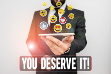Writing note showing You Deserve It. Business concept for should have it because of their qualities...