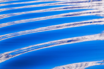 Waves With Blue Faces and White Backs