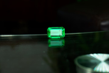 Emerald green On the glass floor and reflections