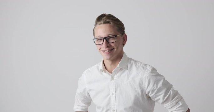 Happy businessman having fun pointing his finger at someone for his misdeed