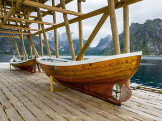 Fototapeta premium Shed with two boats in the fishing villages Sakrisoy of the Lofoten Islands