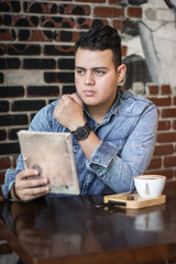 young man in a coffee shop 