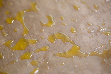 Baking domestic rolls with cheese. Putting cheese on dough for rolls