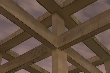 Outdoor cement pillar frame structure at night
