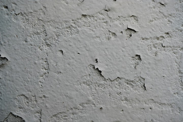 closeup texture of peeling paint on an industrial wall