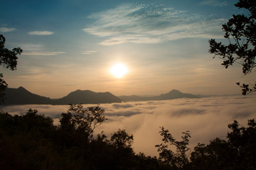 Mountain with white mist in morning sunrise, nature landscape