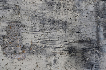 Closeup texture of worn industrial concrete surface