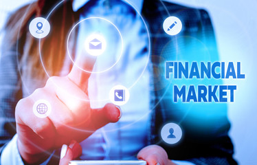 Conceptual hand writing showing Financial Market. Concept meaning market in which showing trade...