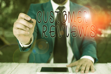 Conceptual hand writing showing Customer Reviews. Concept meaning review of a product or service...