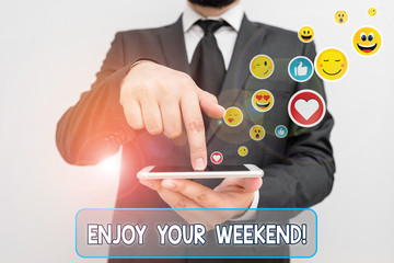 Conceptual hand writing showing Enjoy Your Weekend. Concept meaning wishing someone that something...