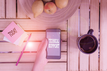 Writing note showing Technical Support. Business concept for service provided by a hardware or software company woman with laptop smartphone and office supplies technology