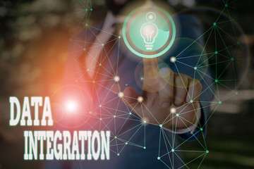 Writing note showing Data Integration. Business concept for involves combining data residing in different sources