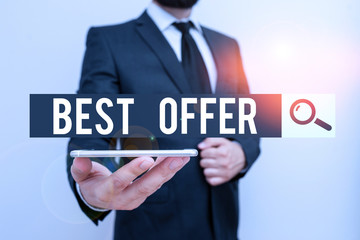 Handwriting text Best Offer. Conceptual photo great agreement entered by parties for their mutual benefit Male human wear formal work suit hold smart hi tech smartphone use one hand