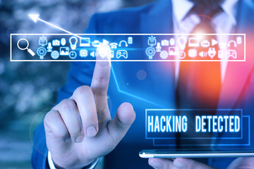 Handwriting text Hacking Detected. Conceptual photo identify the presence or unauthorized access to data