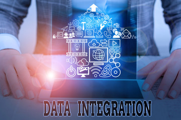 Conceptual hand writing showing Data Integration. Concept meaning involves combining data residing in different sources