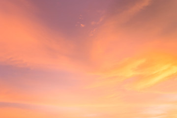 sunset sky with clouds with colorful sunlight in the evening