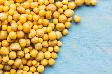 yellow peas on white background