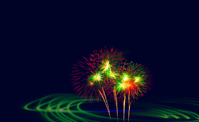 Double exposure Beautiful fireworks and night motion green lights.