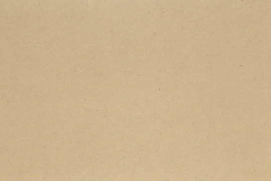 Brown paper texture background or cardboard surface from a paper box for packing.