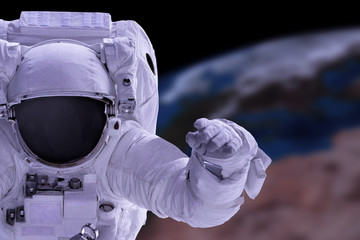 astronaut and earth background, Elements of this Image Furnished by NASA