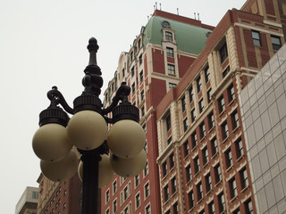 Fototapeta na wymiar street lamp in front of building