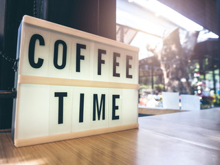 Coffee Time, text in the white light box.