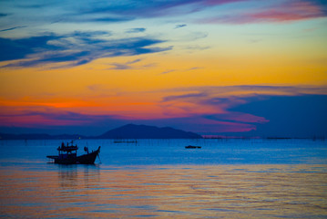 Fototapeta na wymiar boat on sea at sunset