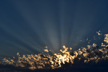 Dramatic Sunset Sky with Clouds and Rays of Light