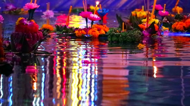Loy Kratong Festival reflection light on water surface
