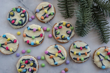 Traditional home made Christmas Lights Cookies on a festive christmas background