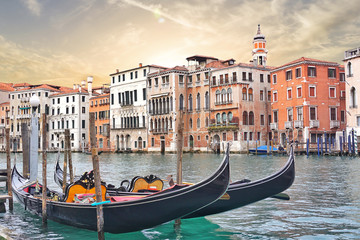 Obraz na płótnie Canvas Beautiful view of traditional Gondolas boat on Canal Grande on sunset in Venice, Italy.Travel Vacation Holiday Concept. 