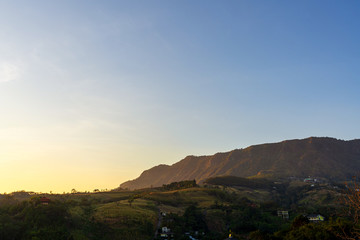 beautiful blue sky high peak mountains mist fog wildlife green forest at Khao Koh Phu Tub Berk Phetchabun Thailand guiding idea long weekend for backpacker camping hiking  