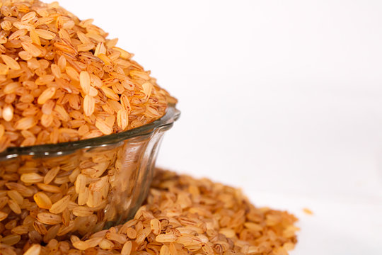 Close up Rice devzira Red with white background 