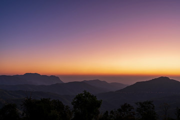 beautiful blue sky high peak mountains mist fog wildlife green forest at Khao Koh Phu Tub Berk Phetchabun Thailand guiding idea long weekend for backpacker camping hiking  