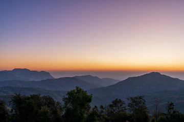 beautiful blue sky high peak mountains mist fog wildlife green forest at Khao Koh Phu Tub Berk Phetchabun Thailand guiding idea long weekend for backpacker camping hiking  