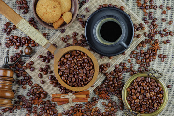Black coffee beans on an old background