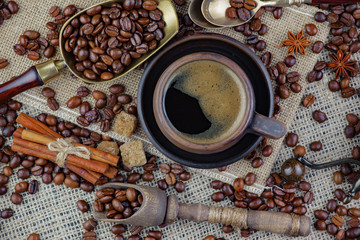 Black coffee on an old background in a cup