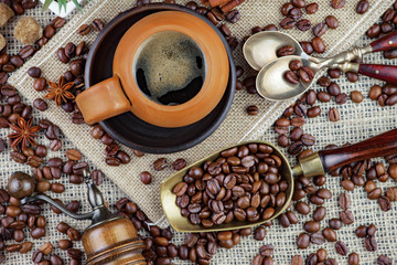 Black coffee on an old background in a cup