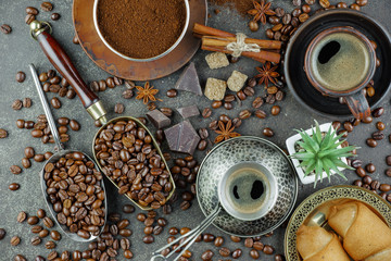 Coffee in a cup and saucer on an old background.