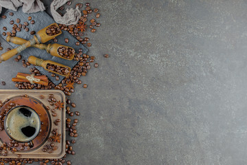 Black coffee on an old background in a cup