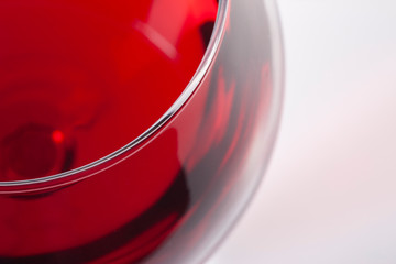 Red wine in glass, viewed from the top corner.