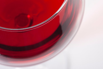 Red wine in glass, viewed from the top corner.