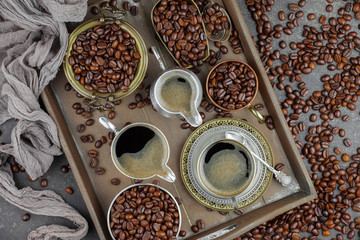 Black coffee on an old background in a cup