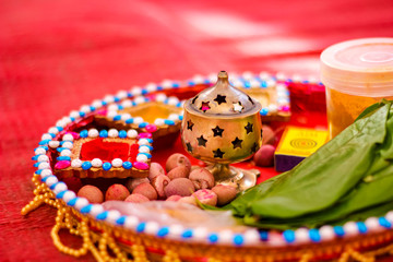 Traditional indian wedding ceremony in Hinduism : puja thali with areca nut 