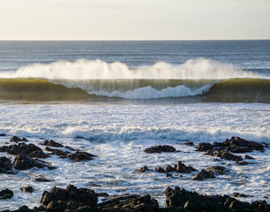 waves breaking on the rocks
