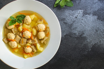 soup meatballs (poultry, chicken, turkey, vegetables) menu concept. food background. top view. copy space
