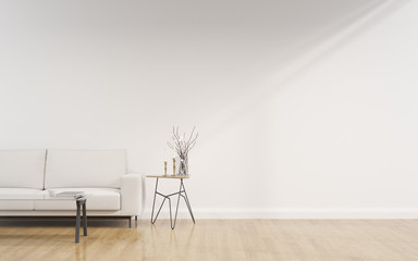 View of white living room in minimal style with sofa and small side table on laminate...