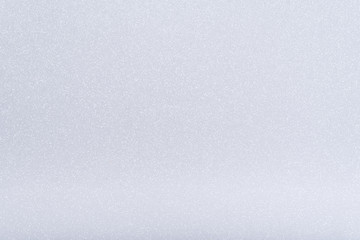 White texture background with sparkles. Festive glitter background
